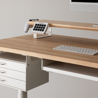 Oak shelf with phone holder on the rail