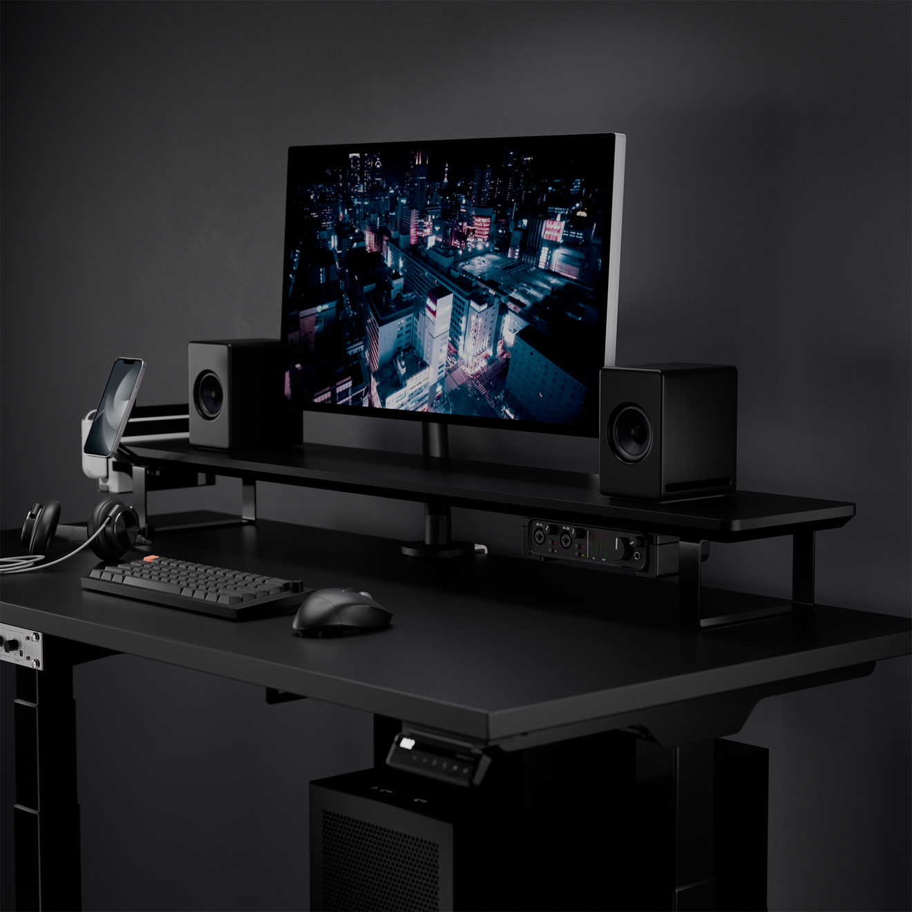 Black desk shelf gaming setup with monitor and speakers