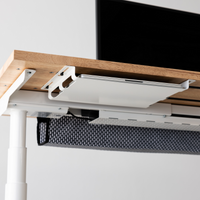 Under-desk accessory tray on the modular rails