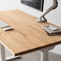 Desk corner with monitor arm and accessories