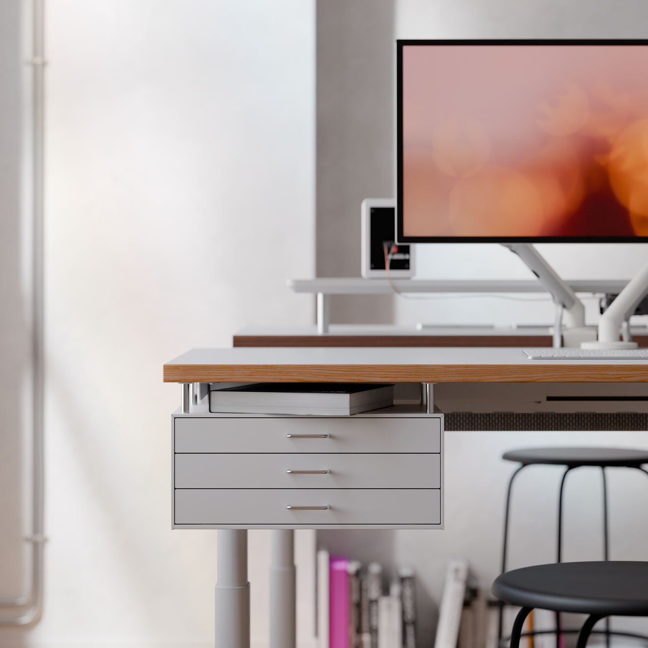 White drawer module in a bright workspace