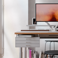White drawer module in a bright workspace