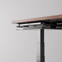 Black desk tray under-desk view